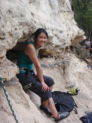 Monica staying dry by staying under the cliff that we...