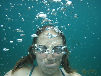 Catherine, blowing bubbles.