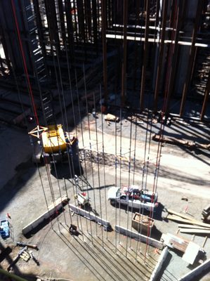Steel tension rods 200+ feet long actively pulling the...