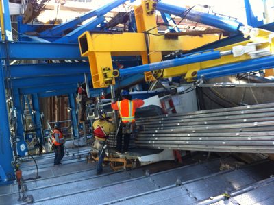 Better view of the jacking equipment, and workers...