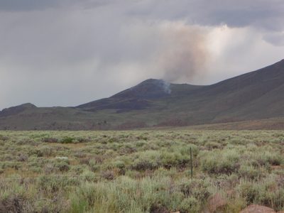 Smoke and flame in the desert sagebrush of the White Mountains.