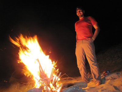 Jasper, standing next to his fire.