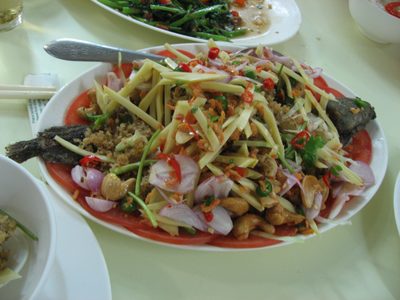 Catfish with sour mango and other vegetables at a...