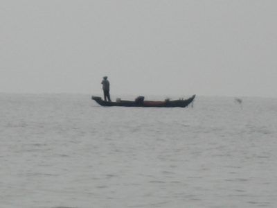 Lone fisherman in the Lake of the Tonle Sap.  This...