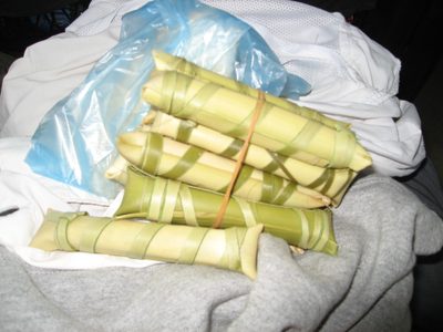 500 riel (about 13 cents) rice snacks wrapped in palm fronds.