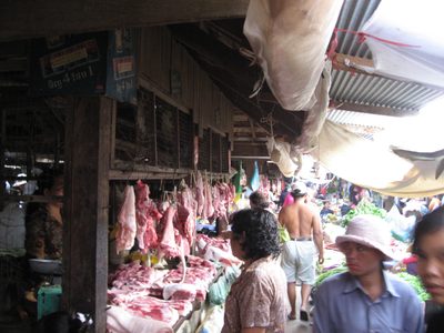 Various animal parts for sale at the Kampot Market. ...