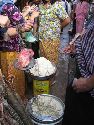 Palm sugar snack for sale at the Kampot Market. ...