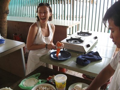 Louise julienning carrot for our spring rolls.