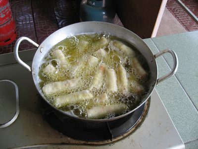 Spring rolls a-frying in King Crab vegetable oil.