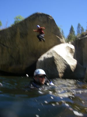 Joel jumping, with Mike in the foreground.