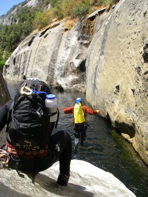Joel, taking the plunge, backpack on.