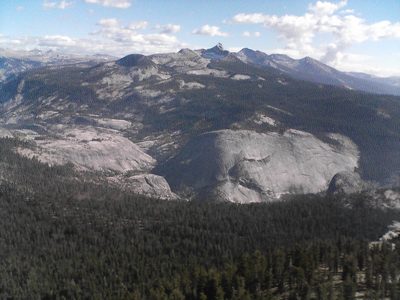 Little Yosemite Valley with very tall spired mountain in...