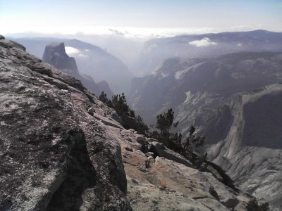 A baby cloud, a few thousand feet below, rubbing up...