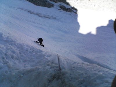 Tom, removing an ice screw.
