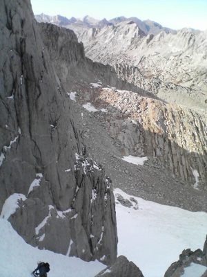Tom, nearing one of the last ice screws on the 4th...