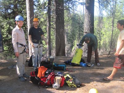 Monica, Yang, Joel and Vinnie gear up. Yang is wearing a...