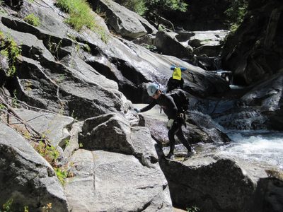 Vinnie, navigating down over some slippery rocks.