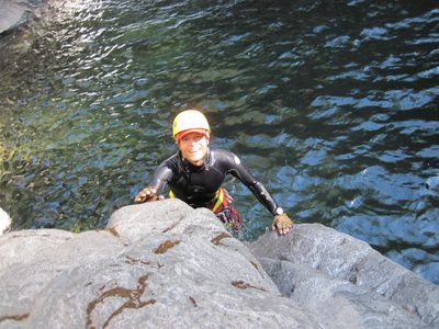 John, climbing out of the river after a jump.