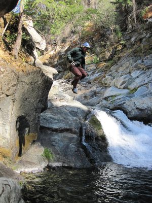 Joel, jumping in the river.