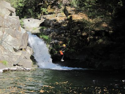 John in mid-air leap.
