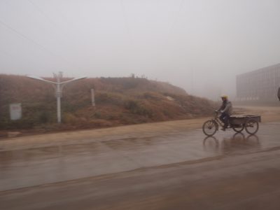 Chinese delivery vehicle. Also note the highway spec...