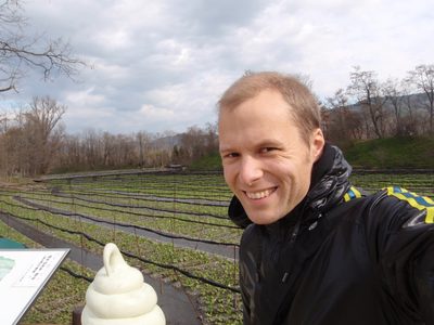 John at the wasabi farm, with a wasabi ice cream cone.