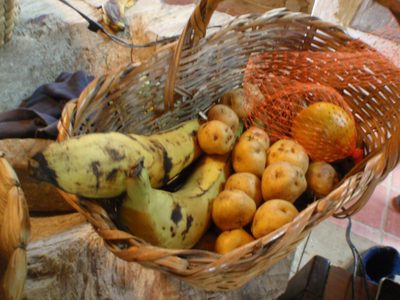 Local potatoes and plantains in my guide's kitchen. ...