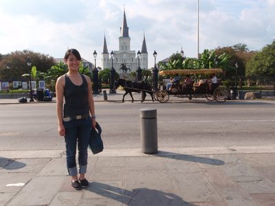 Monica and the St. Louis Cathedral in the background.