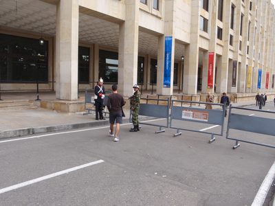 Vinnie walks past a federal security checkpoint.