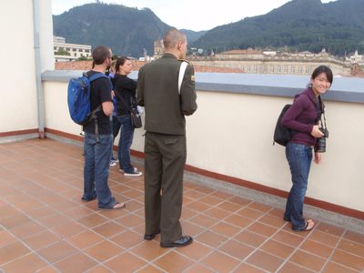 Our guide tells us about the surrounding buildings. 