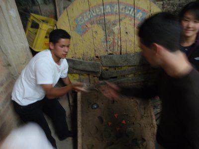 One of our hosts retrieves our metal throwing discs from...