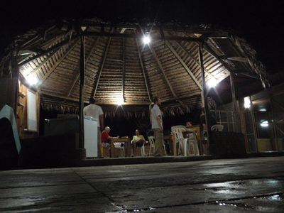 Joel, Vinnie and Monica relaxing at night at our jungle...