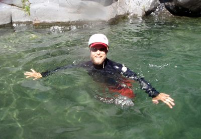 John, taking a swim in the first swimming hole.