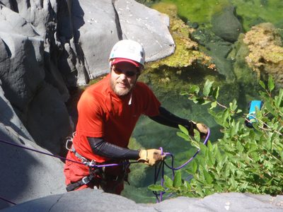 John, managing the rope while on rappel.