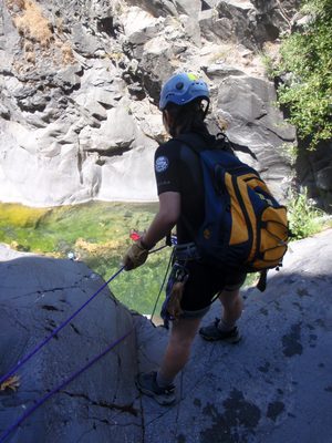 Monica gets ready to go on rappel.