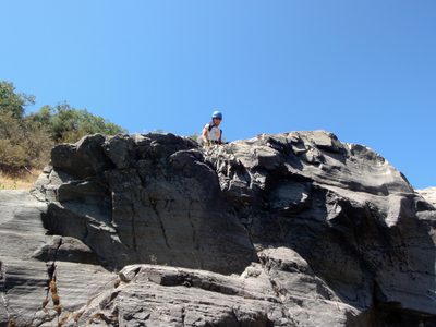 Christina on top of a small cliff.