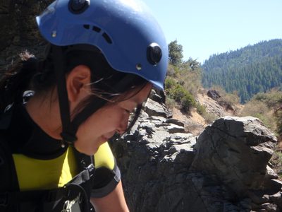 Monica, watching John on the second rappel.