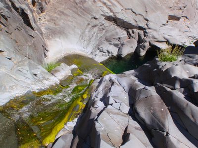 Third drop (65 feet) to a pleasant little swimming hole.