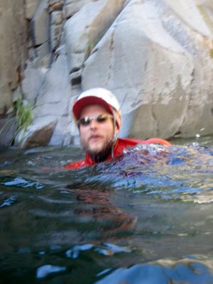 John, swimming back to shore to jump again.