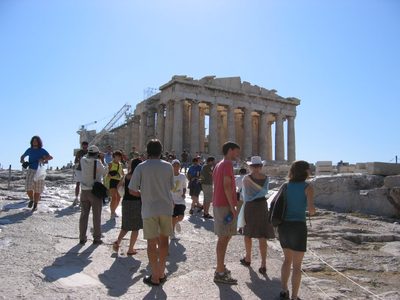 Nick, Clea, and Alison approach the Parthenon at the top...