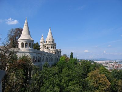 The fairy-tale-like Buda Castle and Budapest in the background.