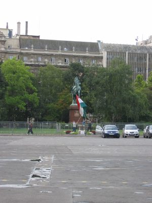 Hungarians raising the flag over a memorial to those...