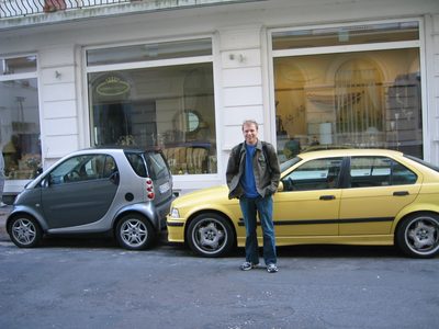 John and an M3 with fake M3 wheels.