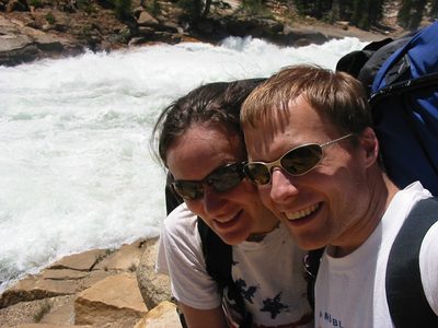 Self photography in front of the rushing Tuolumne River.