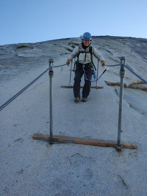 Monica scurries down the last few stanchions on the...