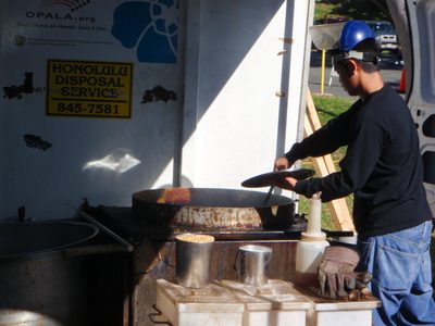 Here's a guy making kettle corn.  We bought some of this...
