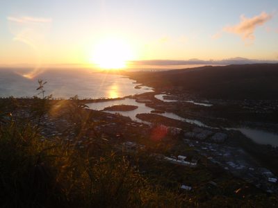 Sunset over Diamond Head, downtown Honolulu slightly to...