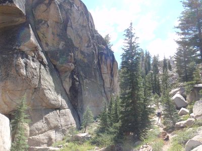 Hiking between cliffs.