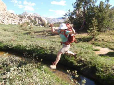 Elaine jumping the stream.