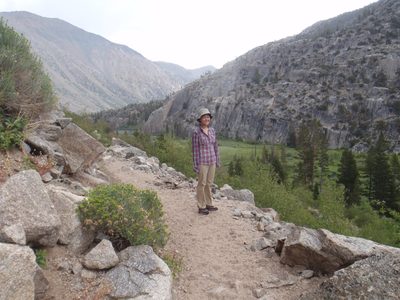 Monica passing the meadows above Barney Lake.